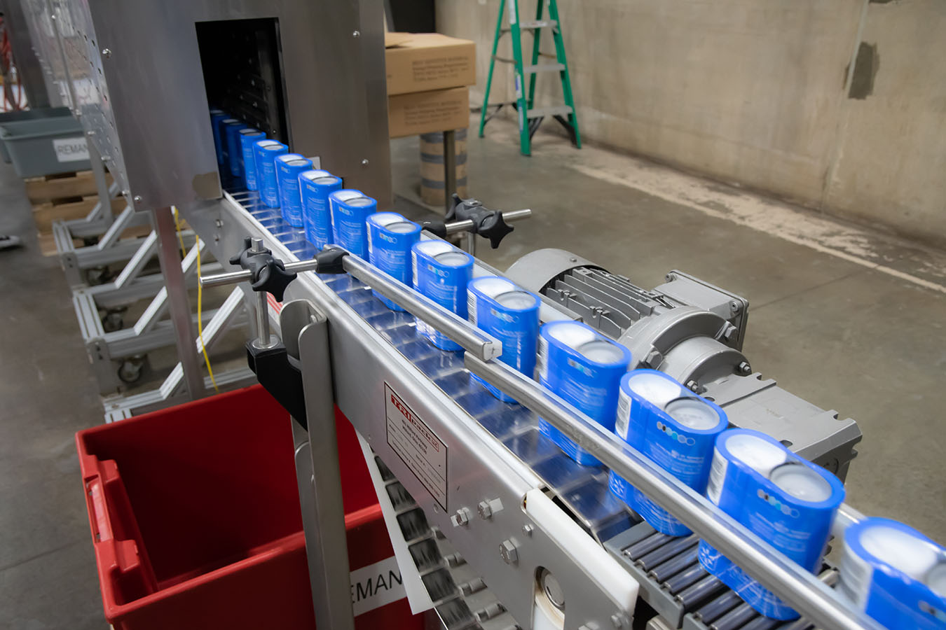 salt and pepper shakers on conveyor belt assembly line