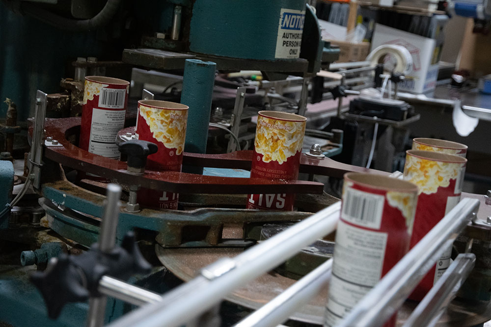 salt shakers on assembly line